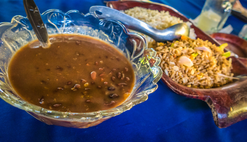 alt="Lunch of beans and rice at an Amazonian Peruvian Village"