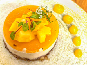 Vegan cheese cake with mango and herbs in Paris